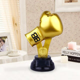 Trophée boxe représentant un gant de boxe en bronze et or