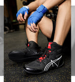 Chaussure de boxe anglaise 2023, portée par un boxeur