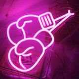 Gants de boxe lumineux dans corbeille