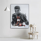 Tableau boxe Mohamed Ali jeune, accroché dans hall d'entrée