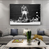 Tableau Mohamed Ali vs Sonny Liston en noir et blanc, encadrée et affiché dans grand salon