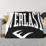 Couverture Everlast, drapé sur canapé