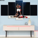 Tableau boxe Muhammad Ali affiché dans séjour