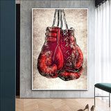 Tableau gants de boxe rouge affiché sur mur salon