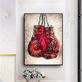 Tableau gants de boxe rouge affiché sur mur entrée