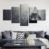 Tableau boxe 5 pièces représentant une paire de gants suspendus au mur