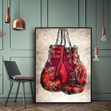 Tableau gants de boxe rouge affiché dans une galerie d'art