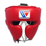 Casque de boxe Winning FG-2900 rouge, vue de face, protections pommettes et écusson Winning