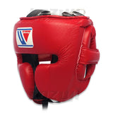 Casque de boxe Winning FG-2900 rouge de profil : protection des oreilles et sangle sous le menton