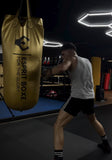 Sac de frappe doré pour boxeur pro
