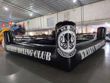 Ring de boxe gonflable full black et personnalisé pour Kraken Boxing Club