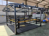 Ring de boxe multifonction, avec rail de convoyage pour sacs de frappe intégré à la structure