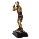 Statue boxeur en position de combat
