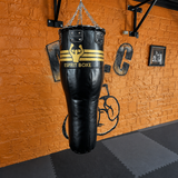 Sac de frappe Uppercut Esprit Boxe en salle de boxe