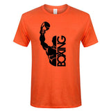 T-shirt boxe BOXING orange, boxeur et lettrage vertical imprimés en noir