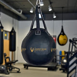 Sac de frappe rond Esprit Boxe en salle de boxe