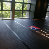 tapis rouleau posés au sol et collés entre eux grace aux bandes velcro périphérique