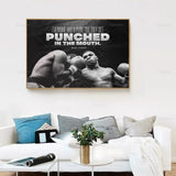 Tableau boxe Mike Tyson avec citation "Everyone had a plan till they get punched in the mouth" affiché dans salon